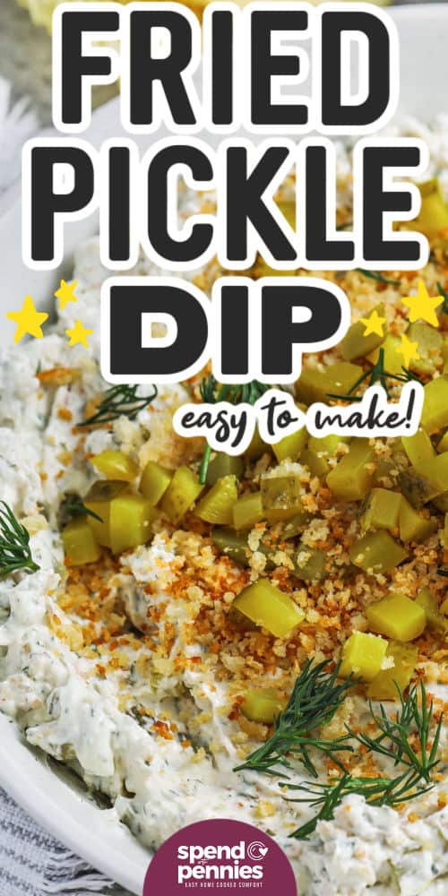 County fair-style deep-fried pickles are now a scrumptious fried pickle dip! Mix cream cheese, sour cream, diced pickles, savory spices, and crispy parmesan breadcrumbs for a crunchy, tangy treat. Add flavors like ranch or buffalo to customize it. With pantry ingredients, this dip offers an irresistible taste of the south. #spendwithpennies easy to make Fried Pickle Dip with writing
