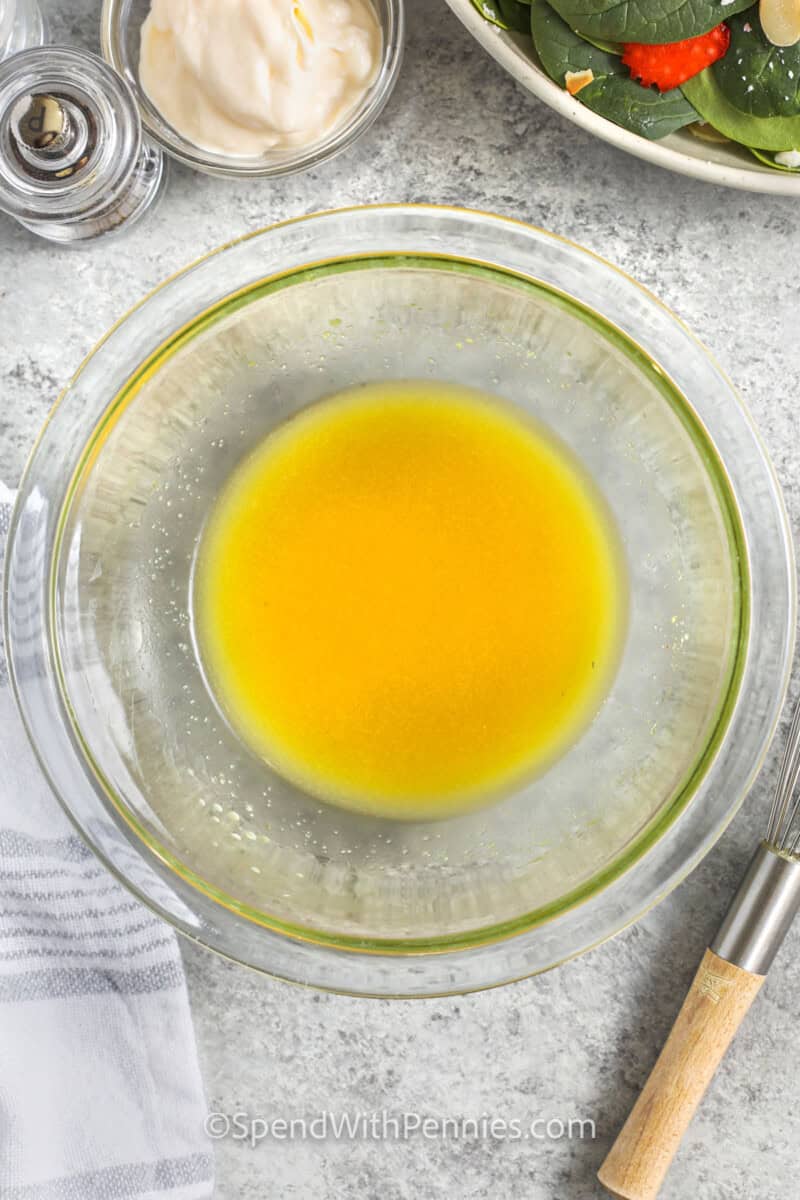 mixed ingredients in bowl to make Poppy Seed Dressing