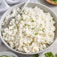 Coconut Rice - Spend With Pennies 4 Coconut Rice in a bowl with a spoon