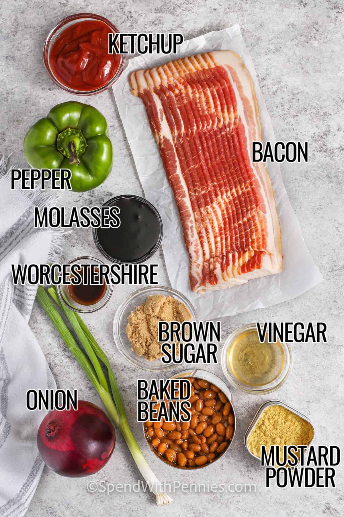 ketchup , bacon , pepper , molasses , worcestershire sauce , onion , brown sugar , baked beans , vinegar , mustard powder with labels to make The Best Baked Beans