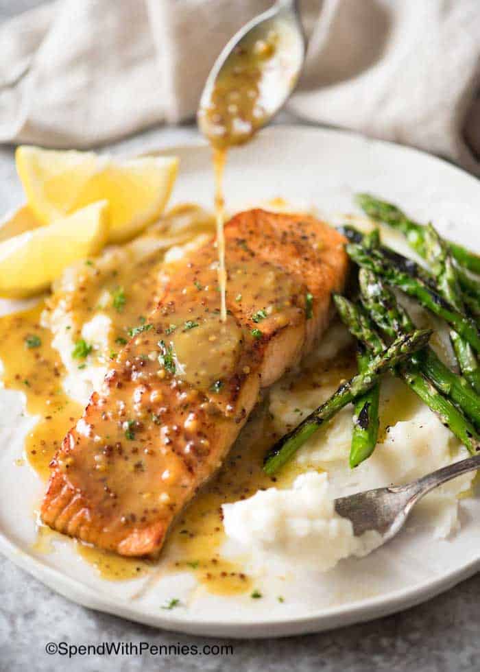 Honey Mustard Salmon with sauce on a spoon