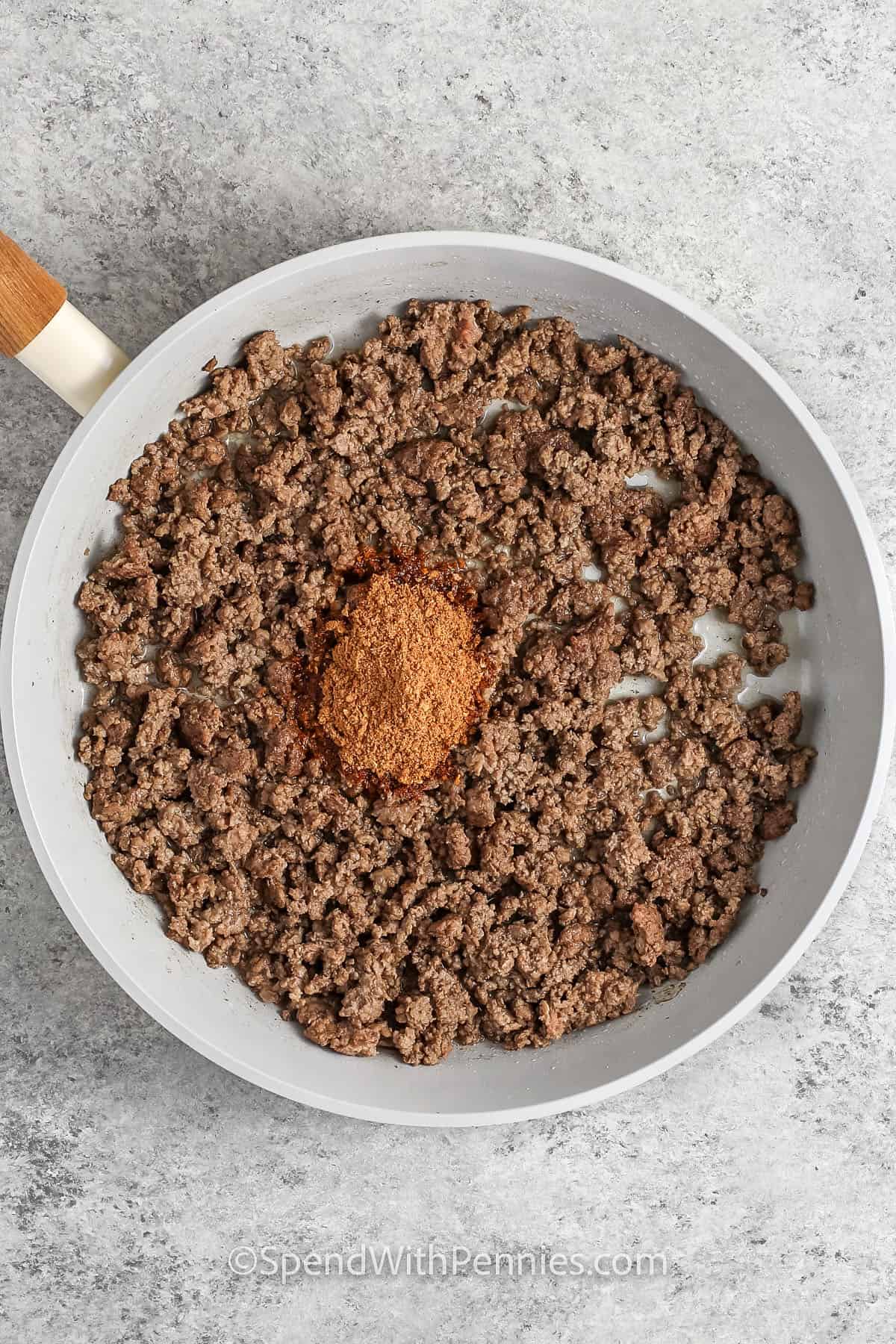 taco meat being prepared in a frying pan