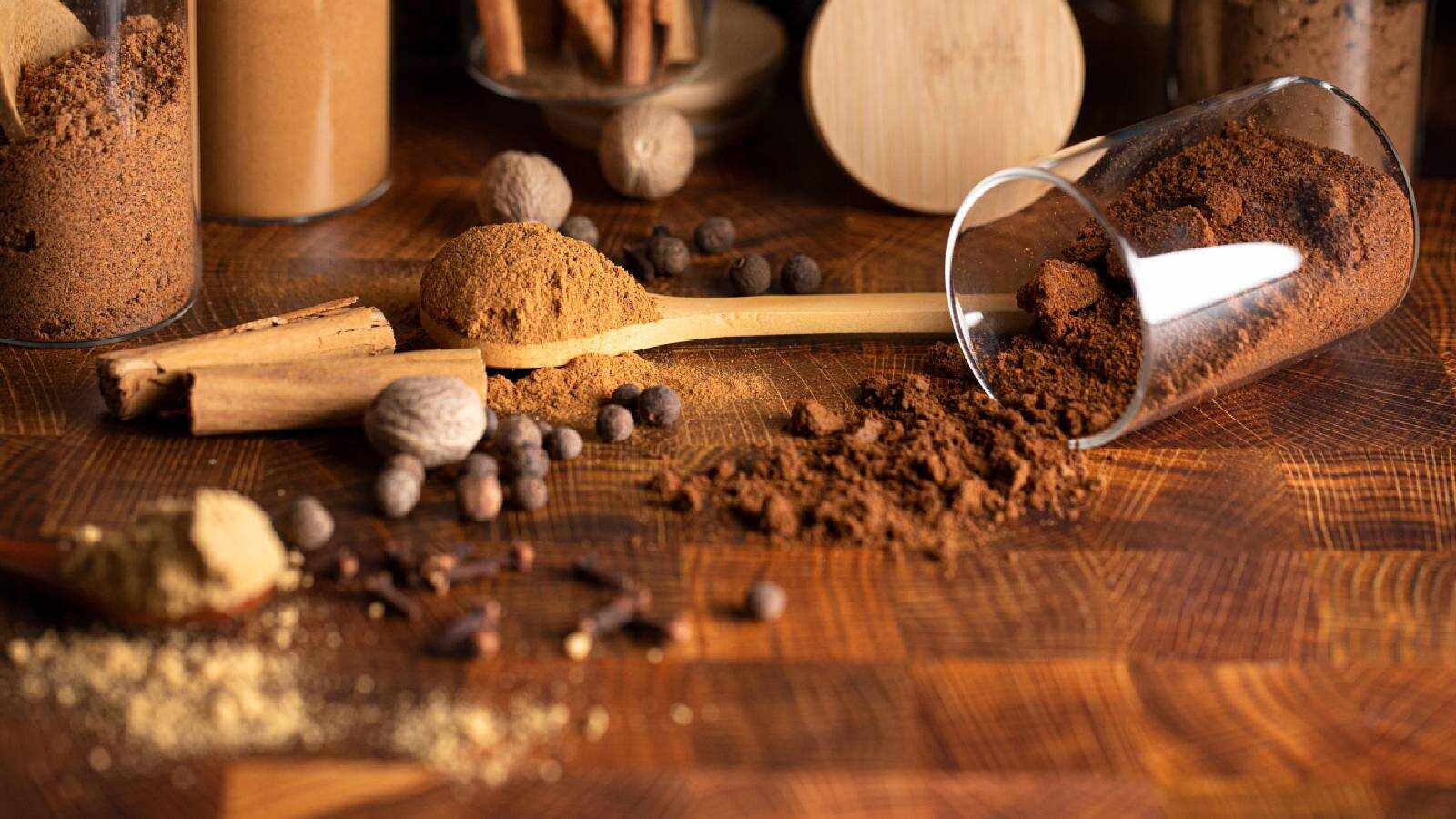 Nutmeg and nutmeg powder, along with other dry, whole spices