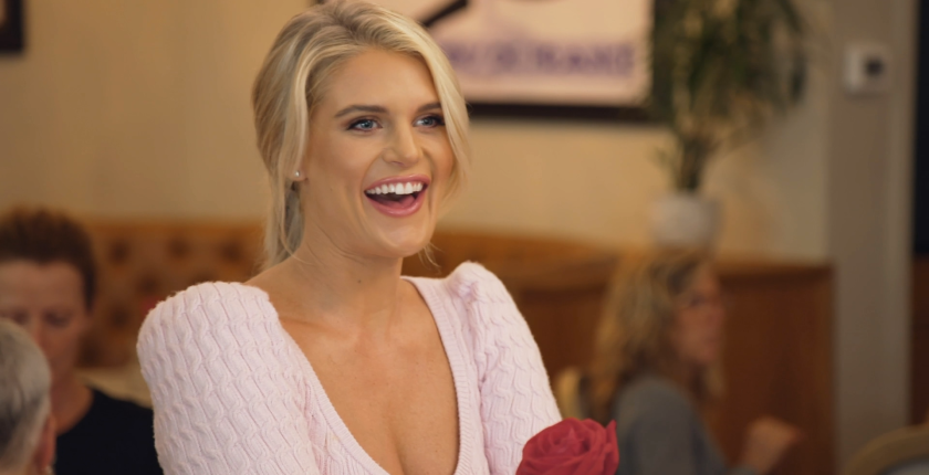 Flashing a smile in a powder pink blouse, Madison LeCroy goes out to eat.