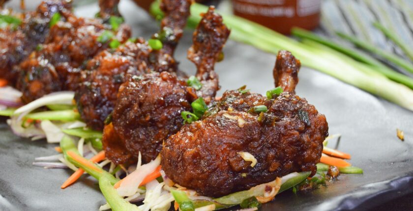 Fried Chicken Lollypop in Manchurian Sauce