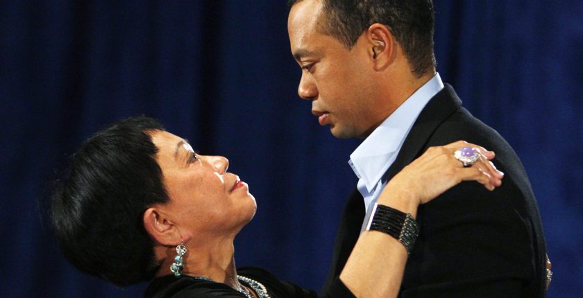 Golfer Tiger Woods hugs his mother Kultida Woods after making a statement from the Sunset Room on the second floor of the TPC Sawgrass, home of the PGA Tour on February 19, 2010 in Ponte Vedra Beach, Florida.