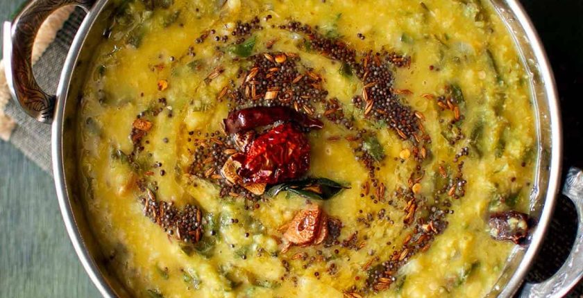 Top view of kadai with spinach dal.